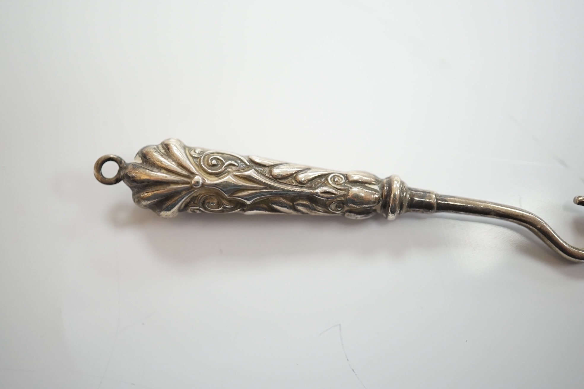 A small collection of mainly small silver items including a Victorian fruit knife, bookmarks, hare child's rattle, etc. Condition - fair